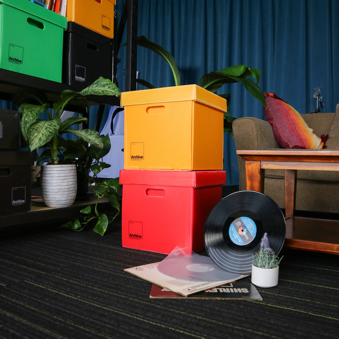 Sturdy vinyl storage box designed for organising and protecting vinyl records, featuring a sleek design and secure lid.